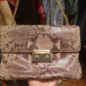 Snake skin mk clutch